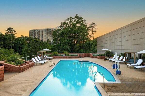 Outdoor pool, open 6 AM to 11 PM, pool cabanas (surcharge)