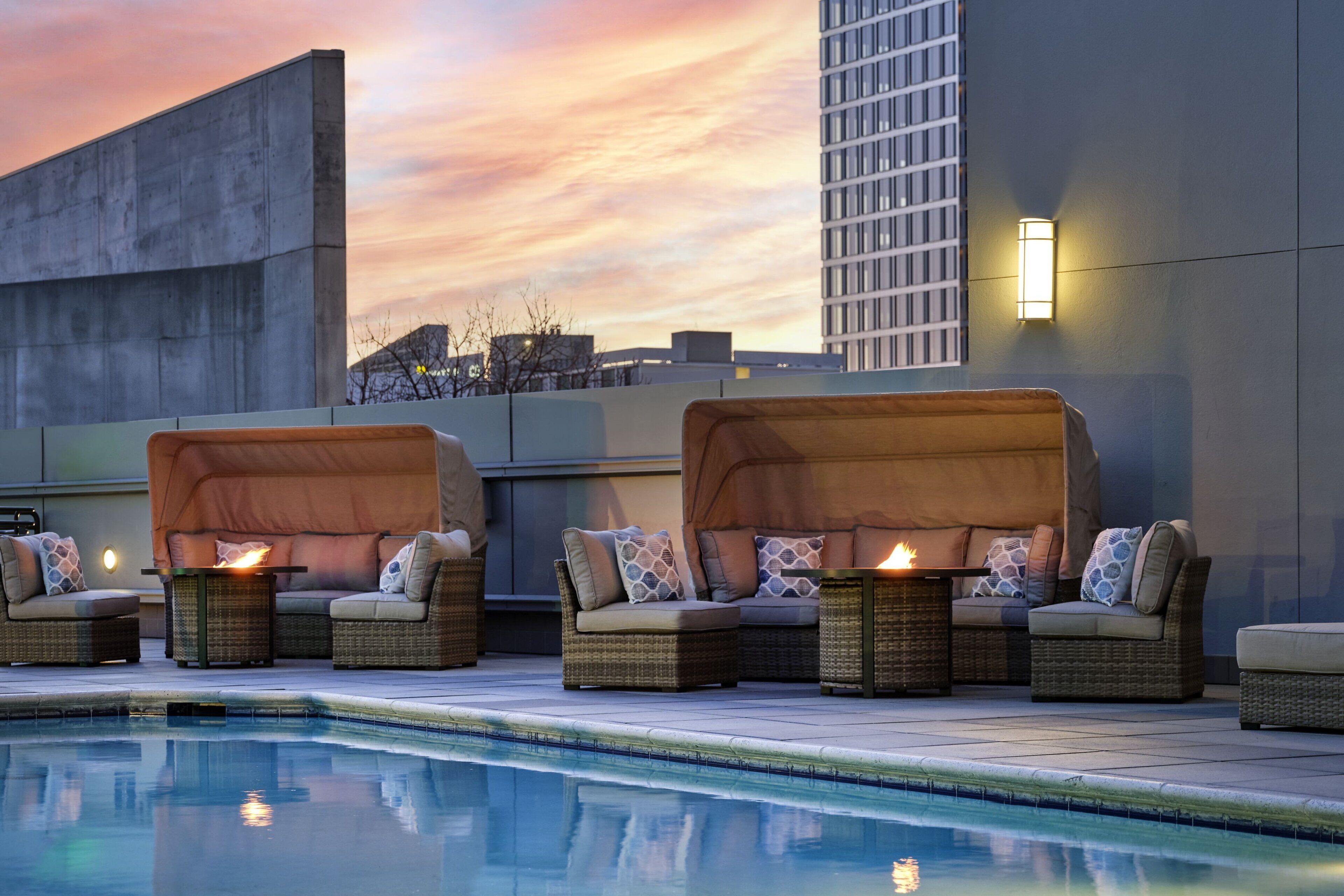 outdoor pool, open 6 am to 11 pm, pool umbrellas, pool loungers