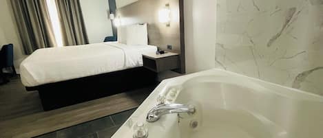 Suite, 1 King Bed, Non Smoking, Jetted Tub | Desk, free WiFi, bed sheets