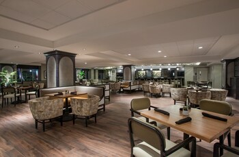 Breakfast, lunch, dinner served; American cuisine  at Magnolia Hotel Houston, A Tribute Portfolio Hotel