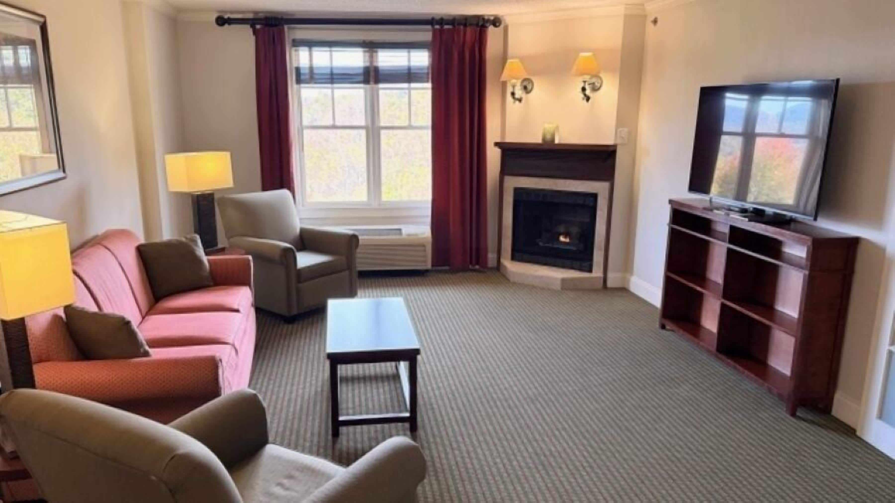 Suite, 1 King Bed, Fireplace | Premium bedding, in-room safe, iron/ironing board, rollaway beds