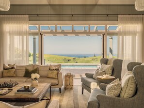 Kauri Cliffs Four Bedroom Villa | Living area | Flat-screen TV, fireplace, heated floors