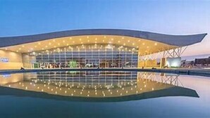 A modern building with a large reflective pool in front. - Holiday Inn Riyadh-Olaya by IHG (Riyadh)