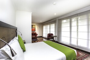Hypo-allergenic bedding, down comforters, minibar, in-room safe