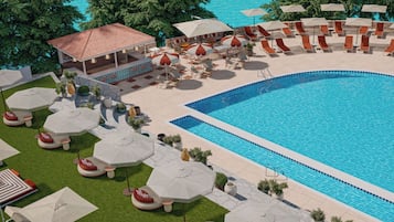 A poolside area with lounge chairs, umbrellas, and a covered seating area.