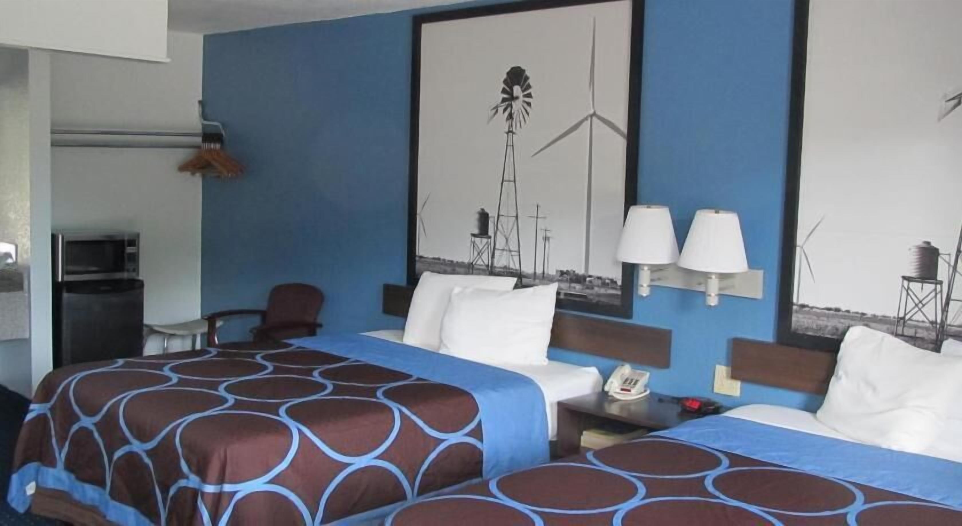 Desk, blackout drapes, iron/ironing board, rollaway beds