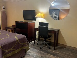 Suite, 1 Queen Bed, Hot Tub | Desk, laptop workspace, blackout drapes, iron/ironing board