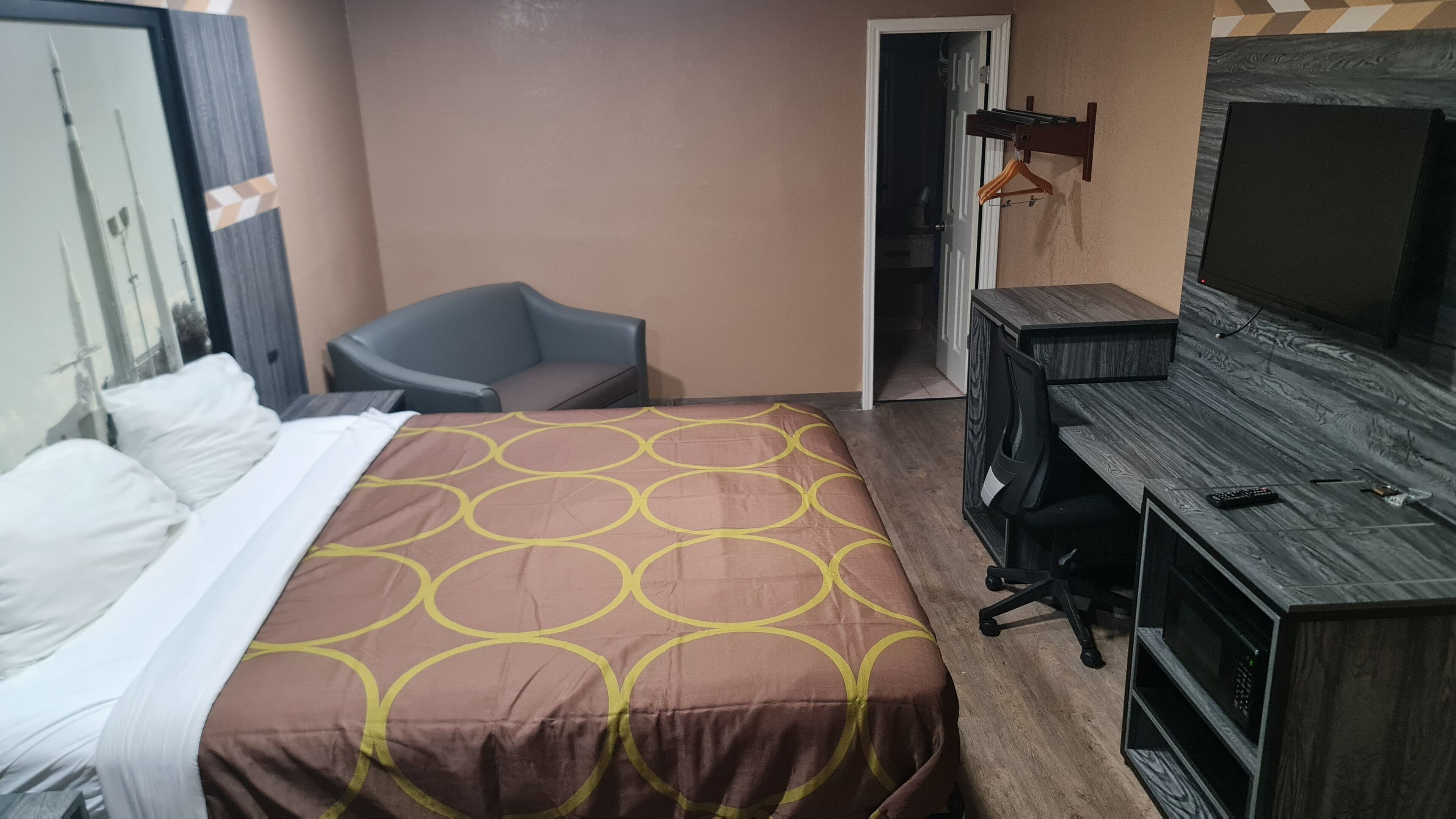 Desk, laptop workspace, blackout curtains, iron/ironing board