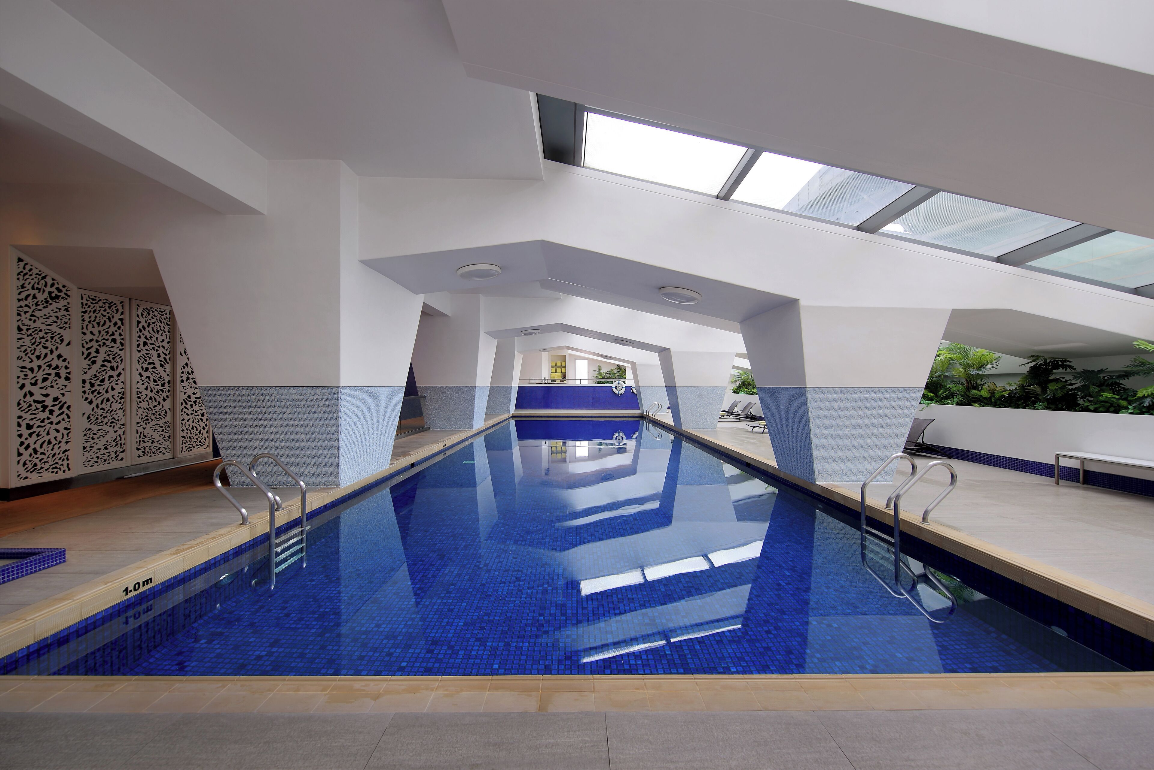 indoor pool, open 7:00 am to 9:00 pm, pool loungers