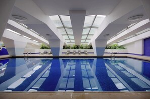 Indoor pool, open 7:00 AM to 9:00 PM, pool loungers