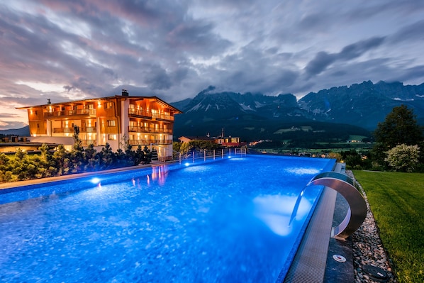 Indoor pool, outdoor pool, open 7:30 AM to 8 PM, pool umbrellas