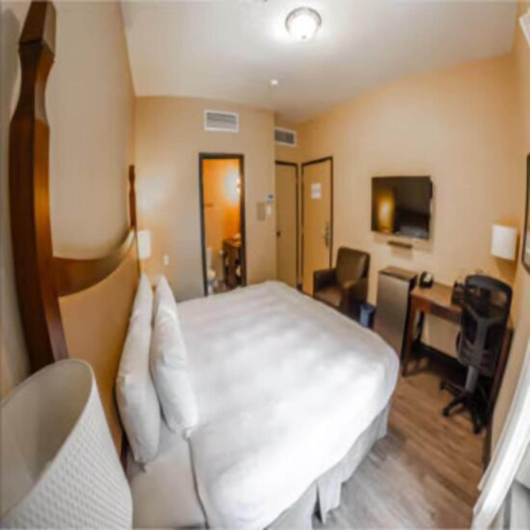 Premium bedding, blackout curtains, iron/ironing board, free WiFi