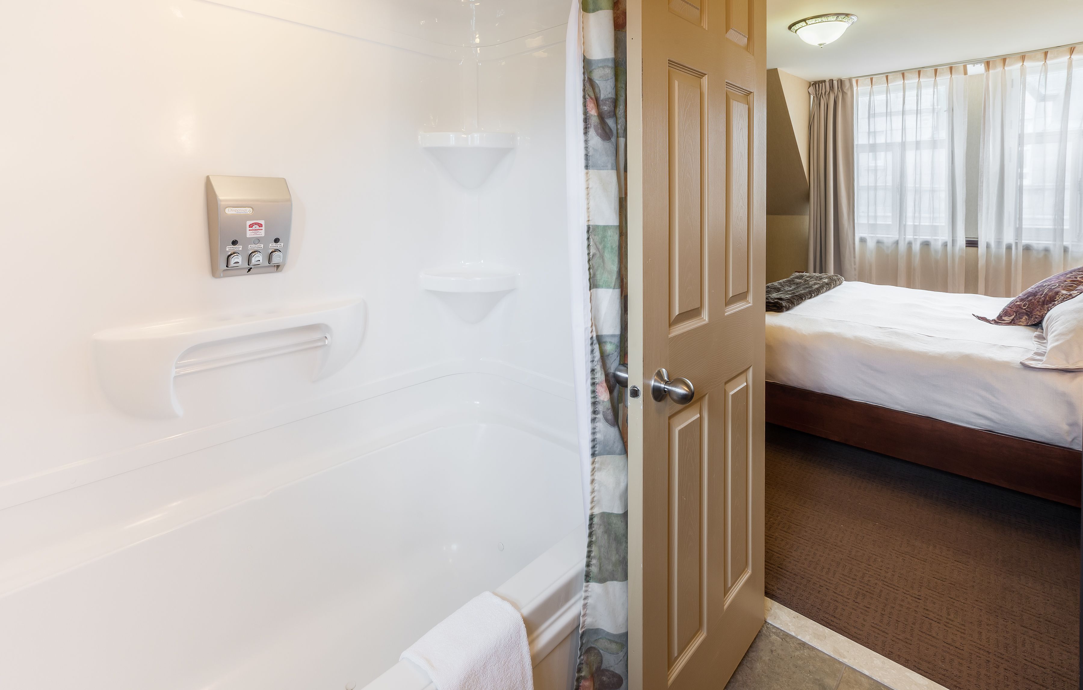 deluxe room, 1 king bed (with elevator) | bathroom | designer toiletries, hair dryer, towels