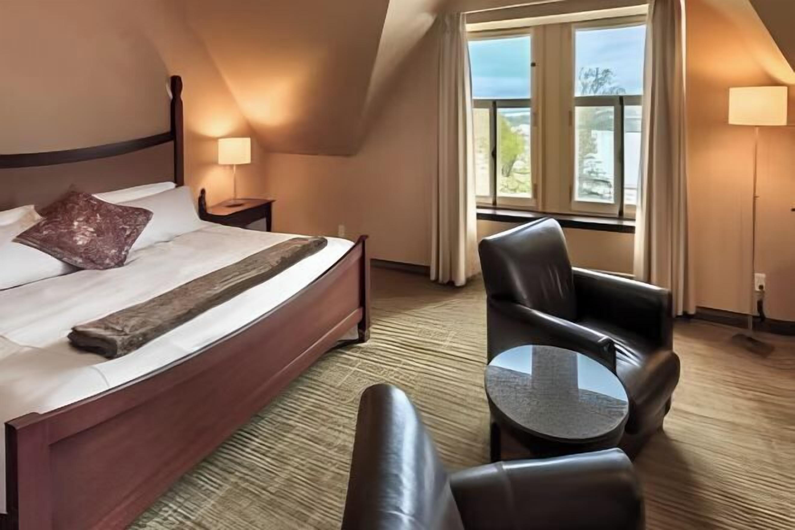 Premium bedding, blackout curtains, iron/ironing board, free WiFi