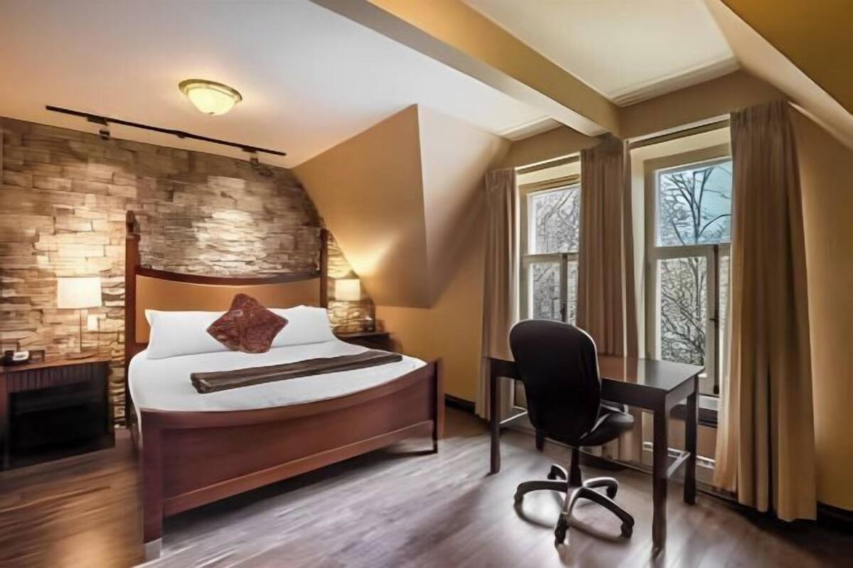 Premium bedding, blackout drapes, iron/ironing board, free WiFi