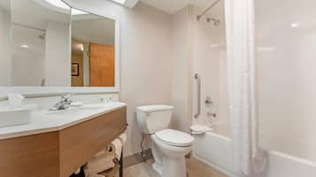 Standard Room, 1 King Bed, Non Smoking | In-room safe, desk, soundproofing, iron/ironing board