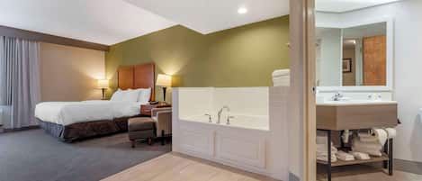 Deluxe Room, 1 King Bed, Non Smoking, Hot Tub | In-room safe, desk, soundproofing, iron/ironing board