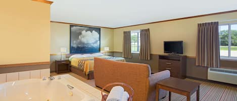 Suite estudio Deluxe, 1 cama King size, para no fumadores | Escritorio, cunas gratuitas, wifi gratis y ropa de cama