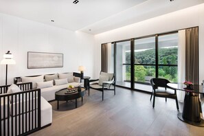 Suíte com design assinado | Área de estar