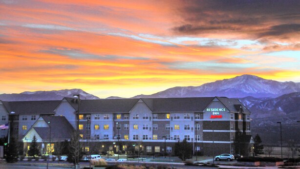 A multi-story hotel with a sign reading "Residence Inn". - Residence Inn by Marriott Colorado Springs North/Air Force Academy (Colorado Springs)