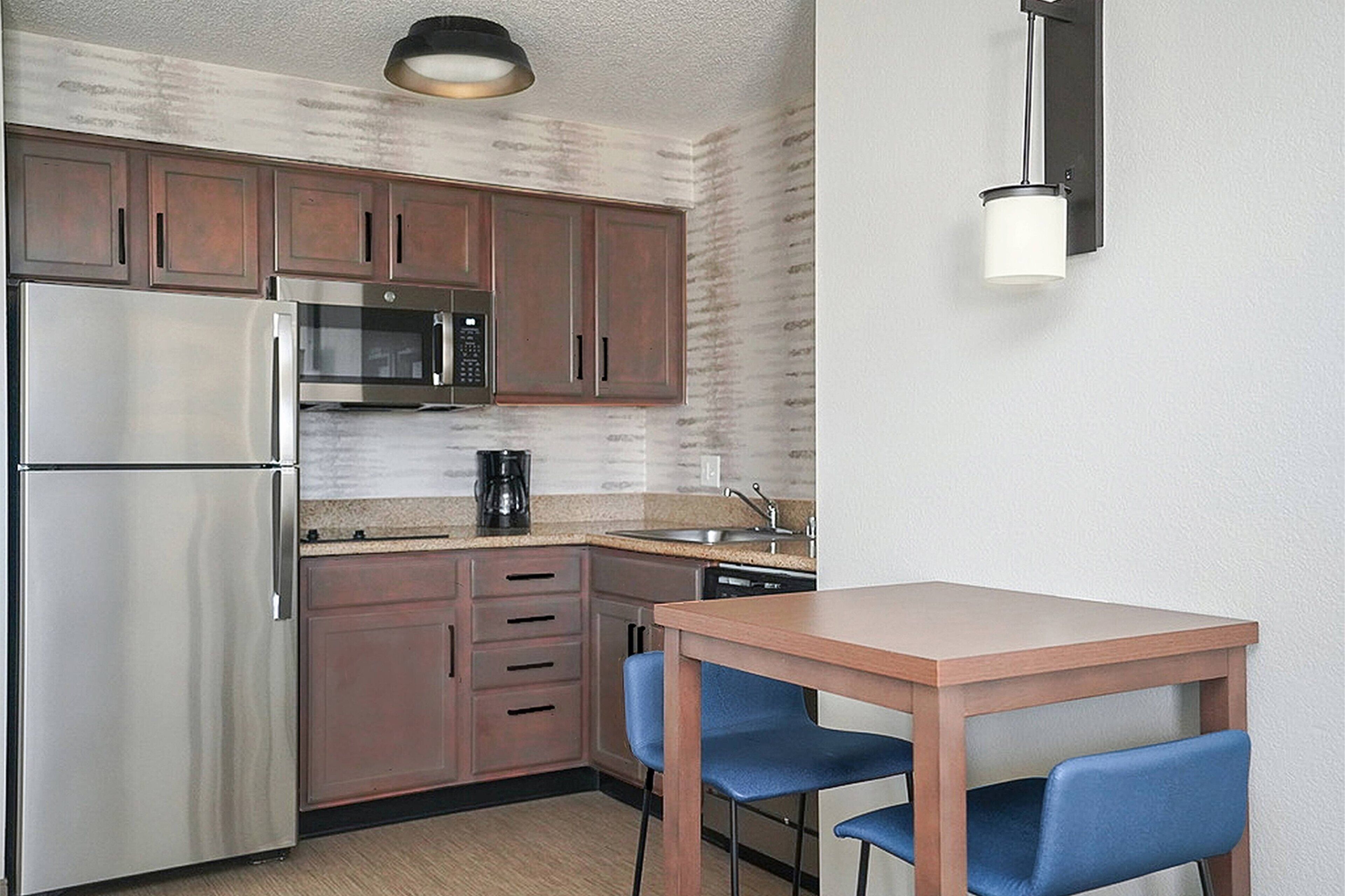 studio, 1 king bed with sofa bed | private kitchen | full-sized fridge, microwave, stovetop, dishwasher