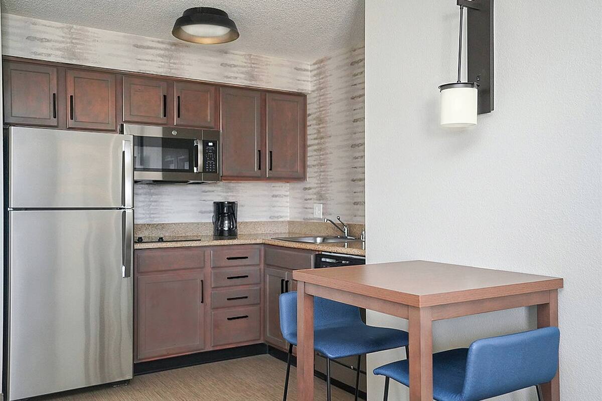 studio, 1 king bed with sofa bed | private kitchen | full-sized fridge, microwave, stovetop, dishwasher