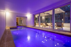 Indoor pool, outdoor pool, pool umbrellas, pool loungers