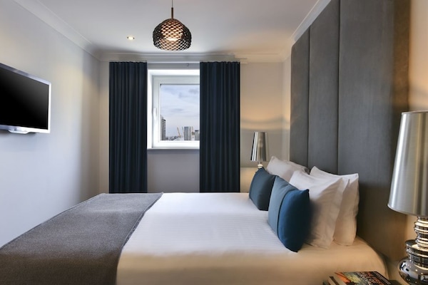 Deluxe Apartment, 2 Bedrooms | Hypo-allergenic bedding, in-room safe, laptop workspace, blackout drapes