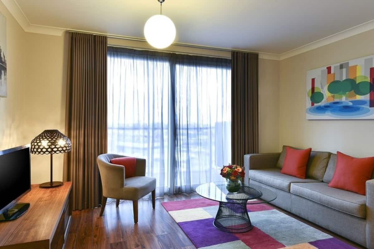 Deluxe Room, 1 Bedroom | Living area