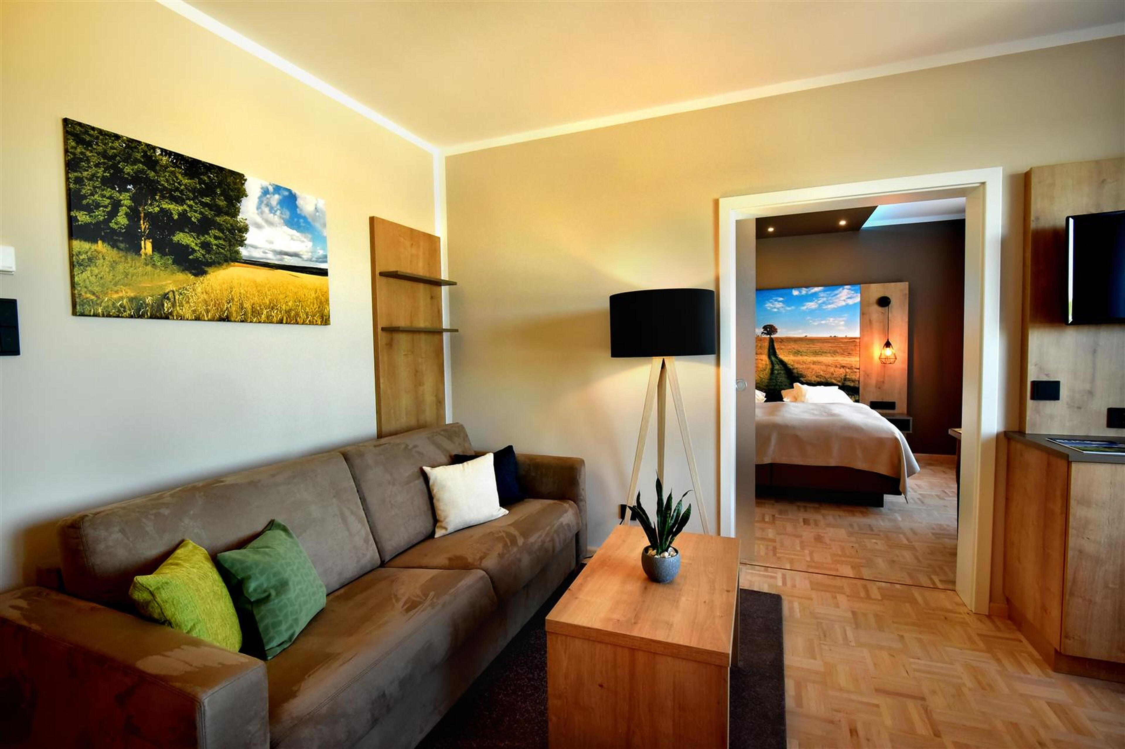 junior suite | living area | flat-screen tv, ping pong, toys, pay films