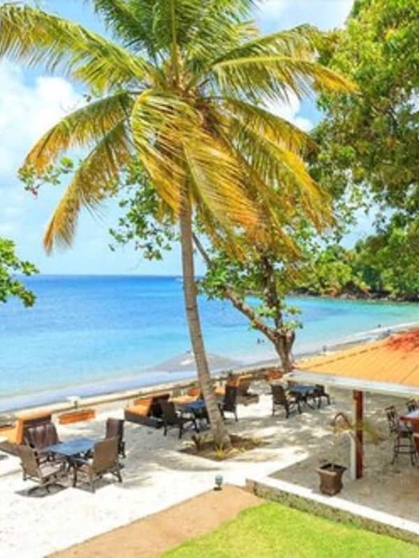 On the beach, sun loungers, beach towels, beach bar