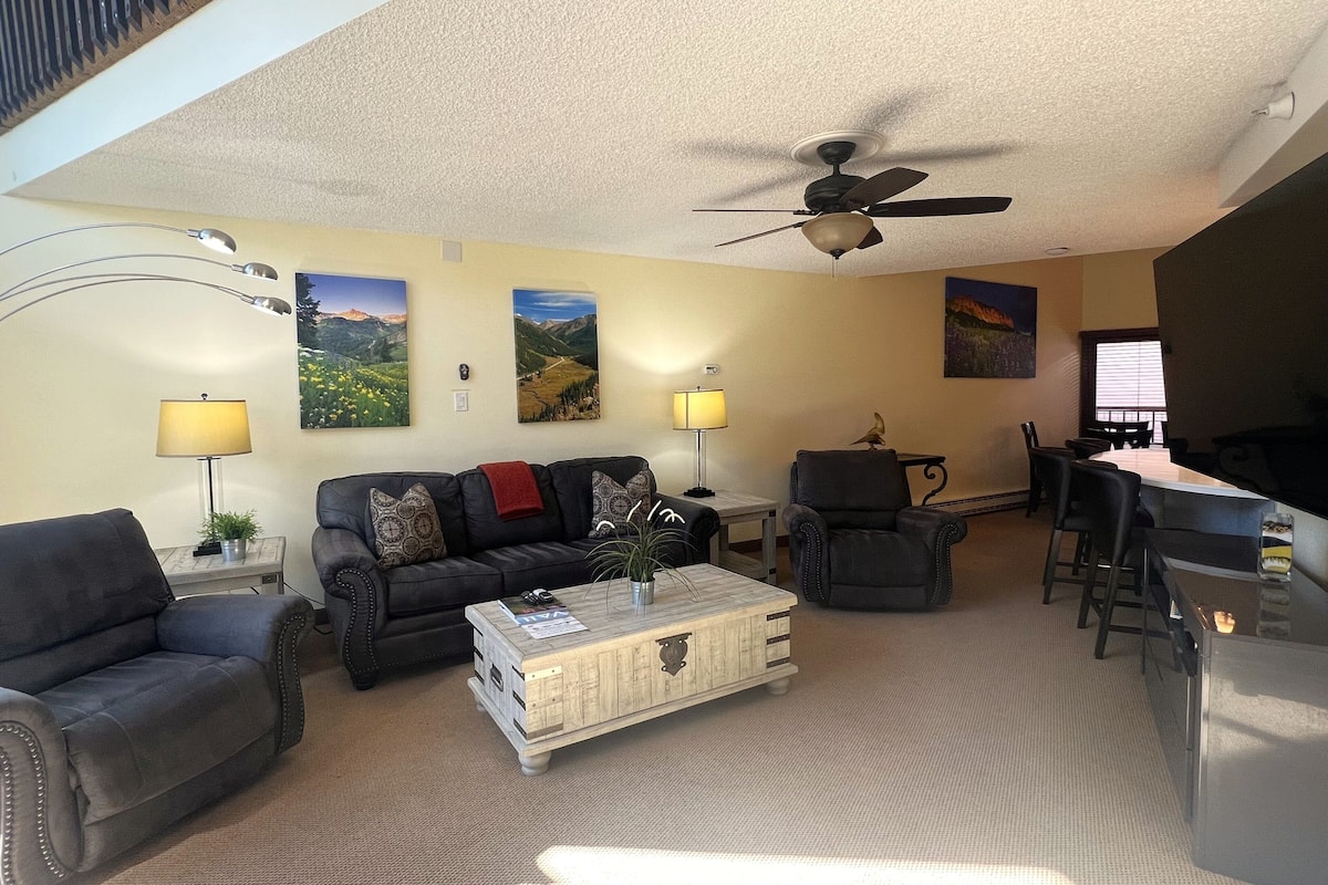Family Penthouse | Living area | 50-inch LCD TV with satellite channels, TV, fireplace