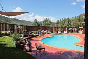 Outdoor pool, pool umbrellas, pool loungers