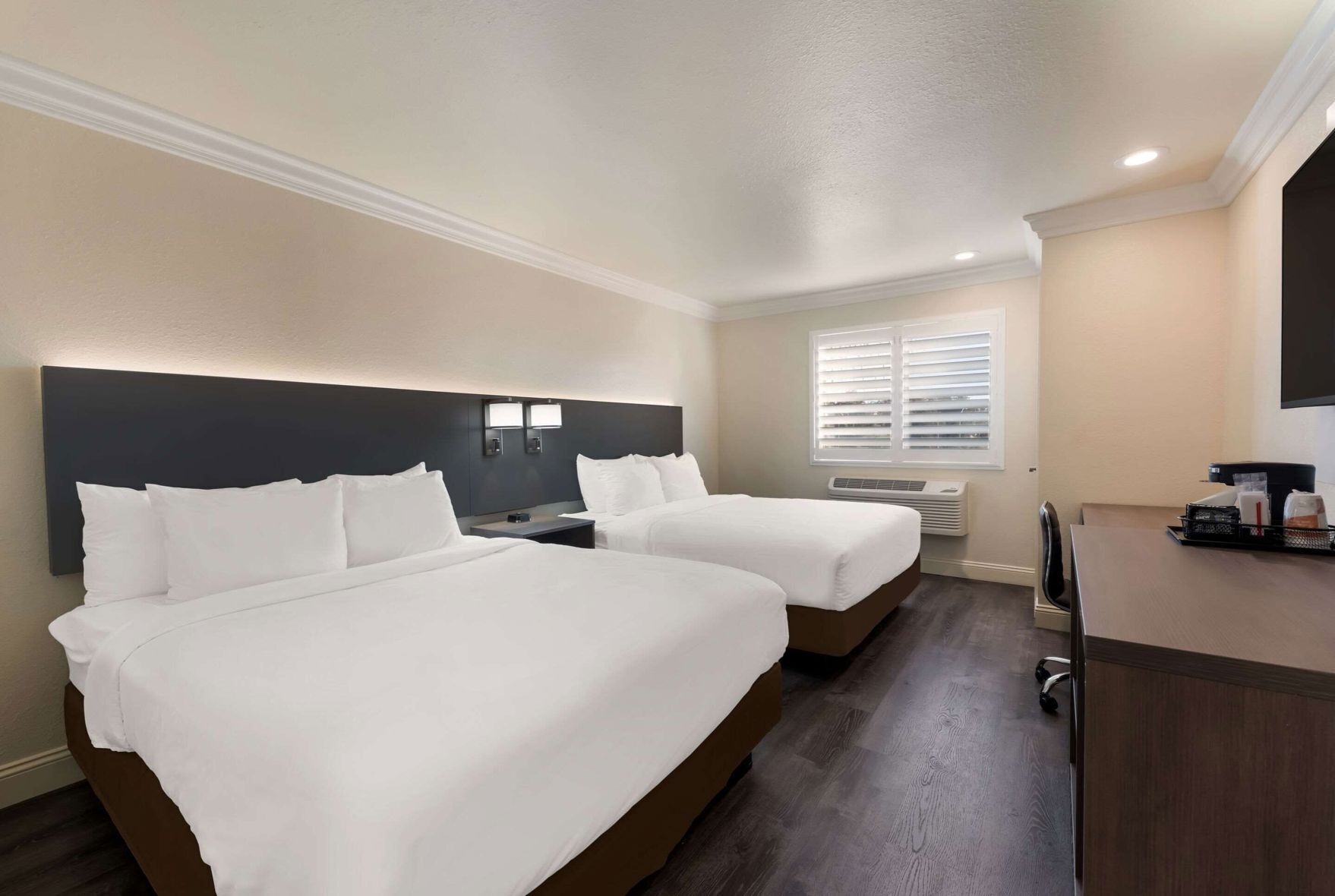 Desk, laptop workspace, free WiFi, bed sheets