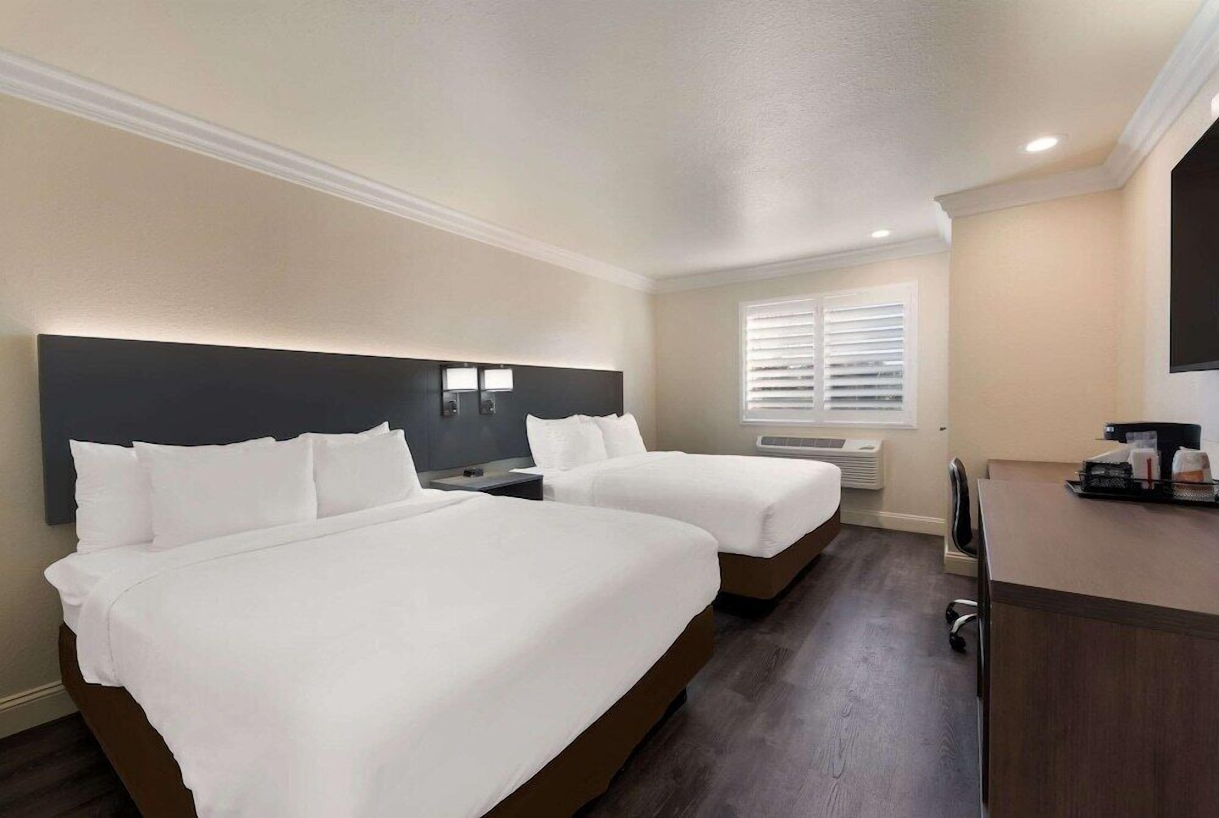 Desk, laptop workspace, free WiFi, bed sheets