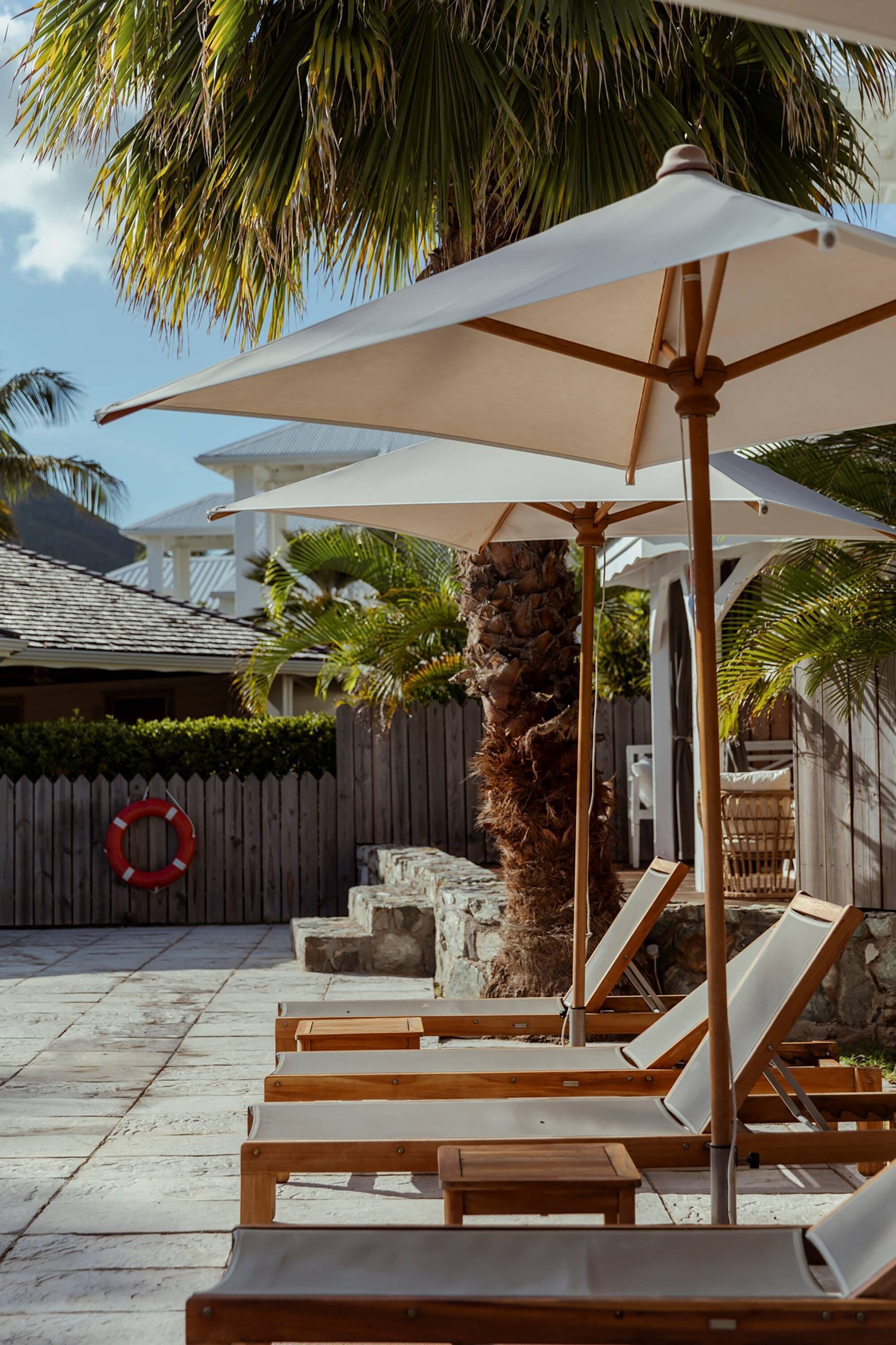 outdoor pool, open 9:00 am to 8:00 pm, pool loungers