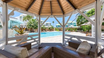 Outdoor pool, open 9:00 AM to 8:00 PM, pool loungers