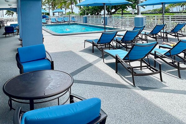 Outdoor pool, pool umbrellas, pool loungers