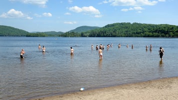 Private beach, sun loungers, beach towels, beach volleyball