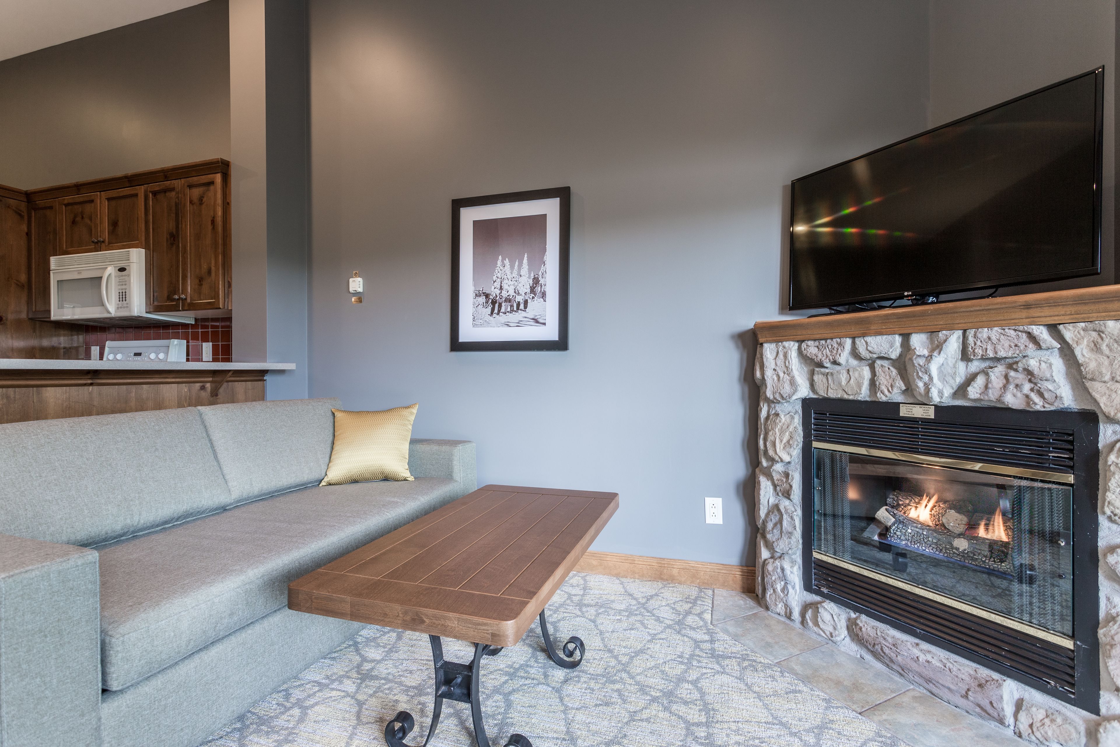 suite (pets not allowed) | living area | 43-inch tv with cable channels, fireplace
