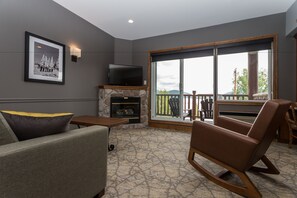 43-inch TV with cable channels, fireplace