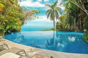 Outdoor pool, pool umbrellas, pool loungers