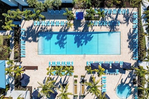 2 outdoor pools, open 8:00 AM to 7:00 PM, pool umbrellas, sun loungers