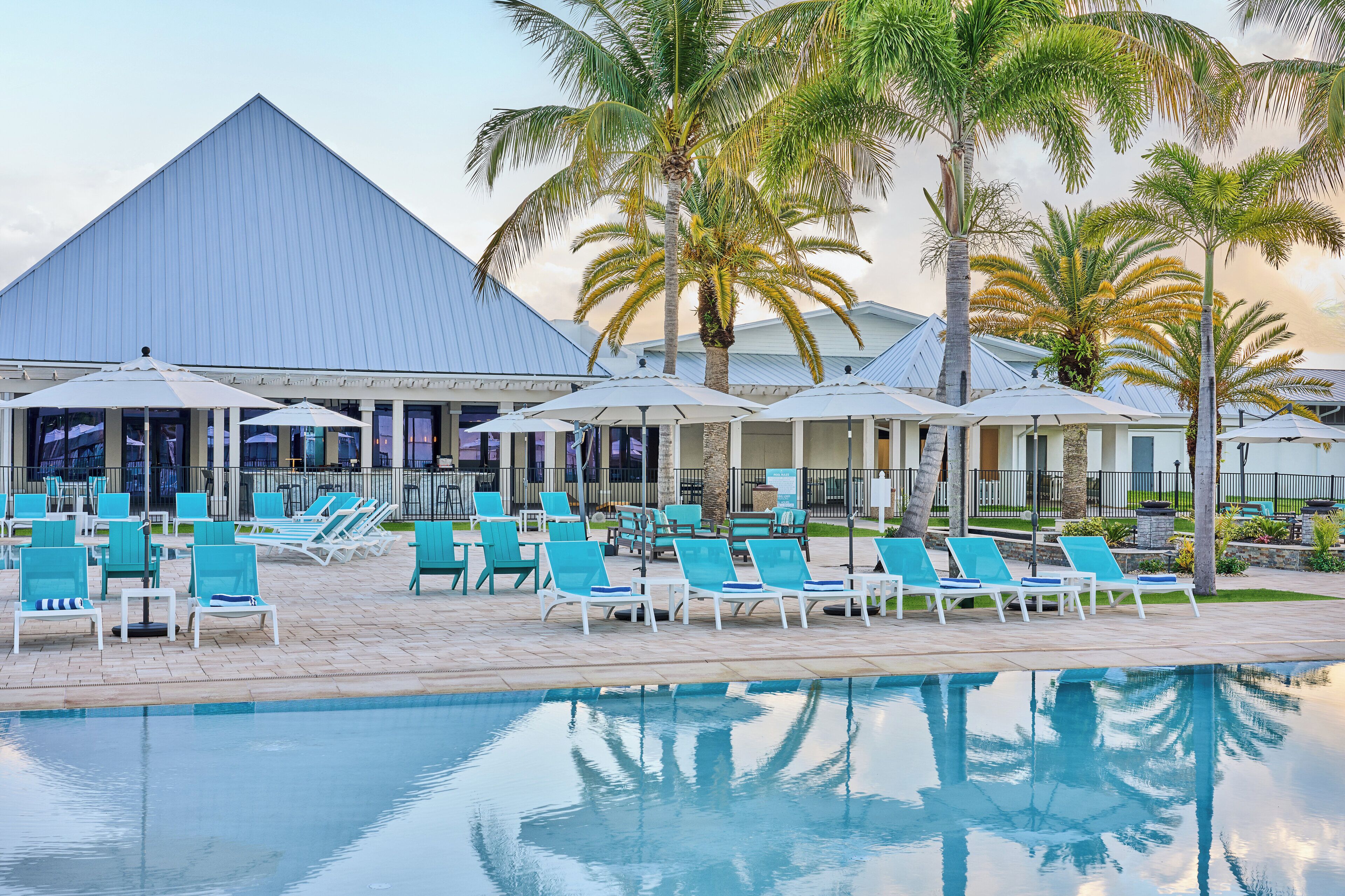 2 outdoor pools, open 8:00 AM to 7:00 PM, pool umbrellas, pool loungers