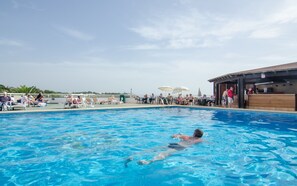 Outdoor pool, pool umbrellas, sun loungers