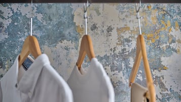 A wall with a distressed, textured surface.