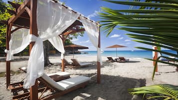 On the beach, free beach shuttle, free beach cabanas, sun-loungers