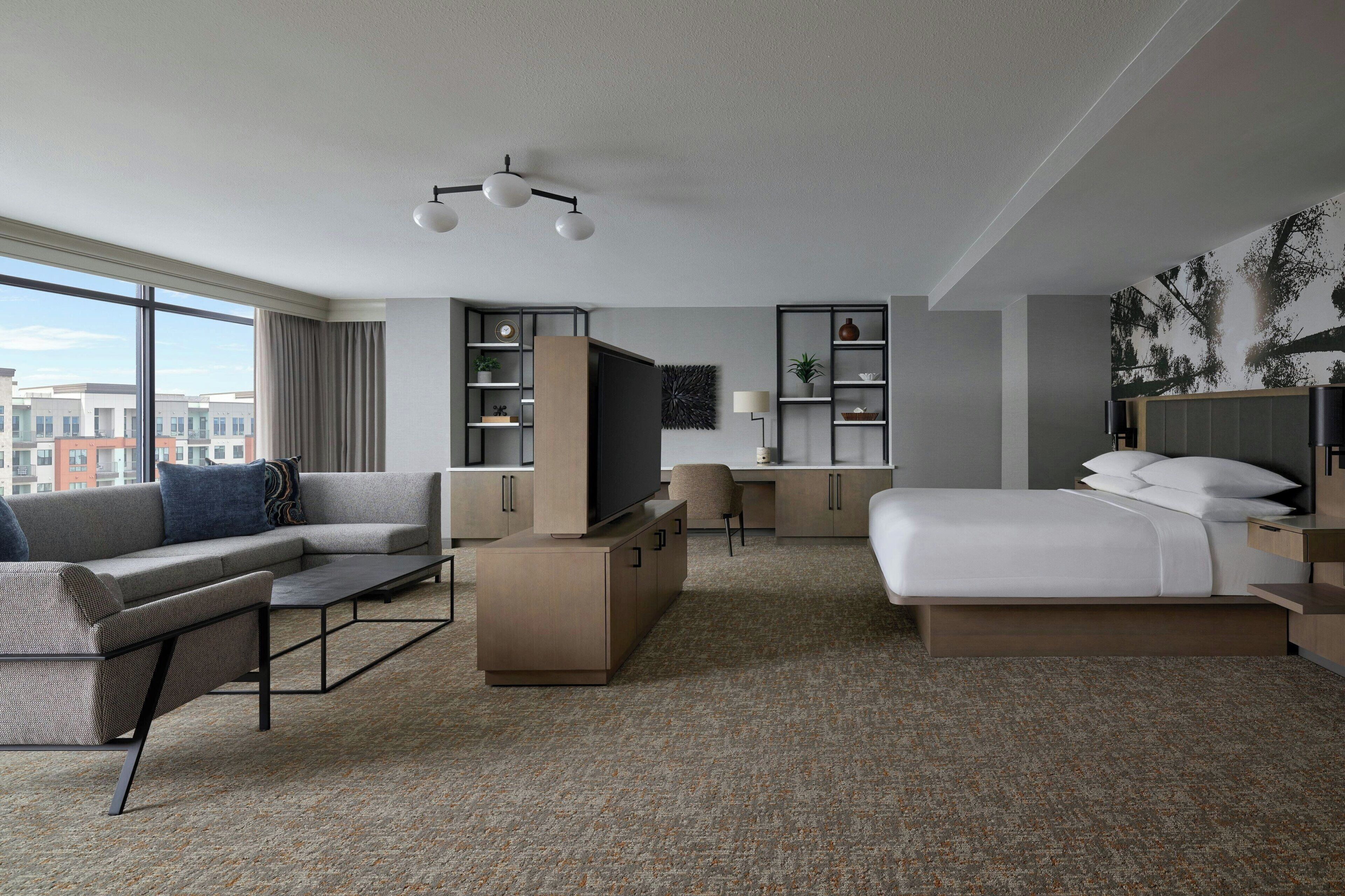 premium bedding, desk, laptop workspace, blackout curtains