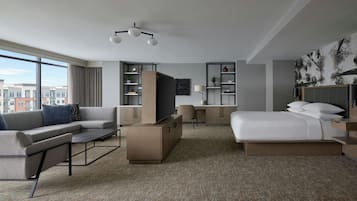 Premium bedding, desk, laptop workspace, blackout drapes