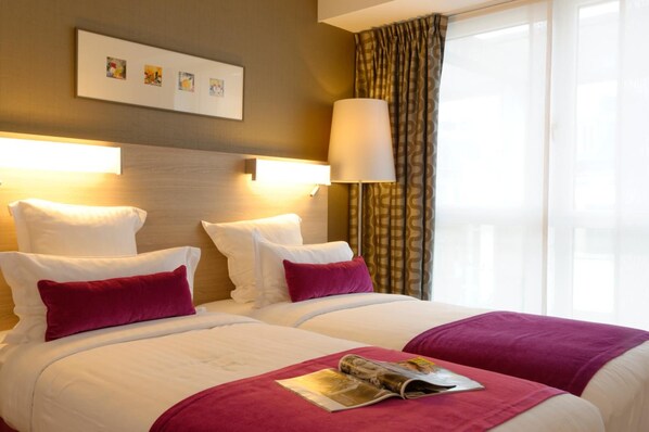 Premium bedding, in-room safe, desk, blackout curtains